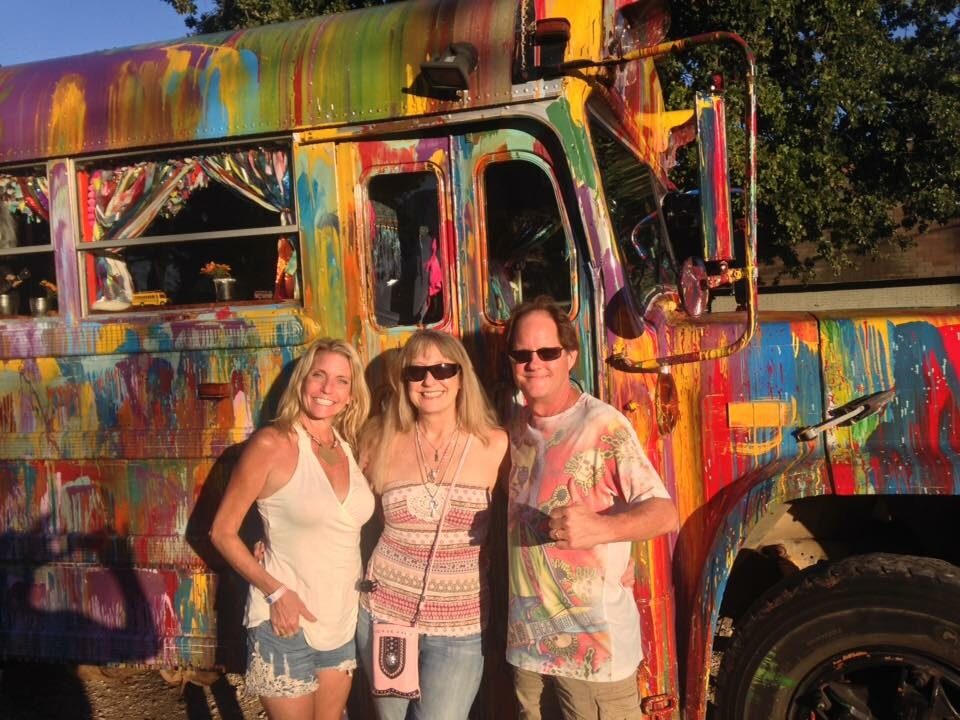 Three friends posing in front of SUGAREE's earlier tie-dye paint job