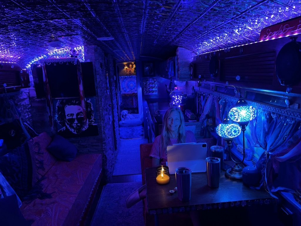 Hanging out after dinner inside SUGAREE at night, candlelight and string lights