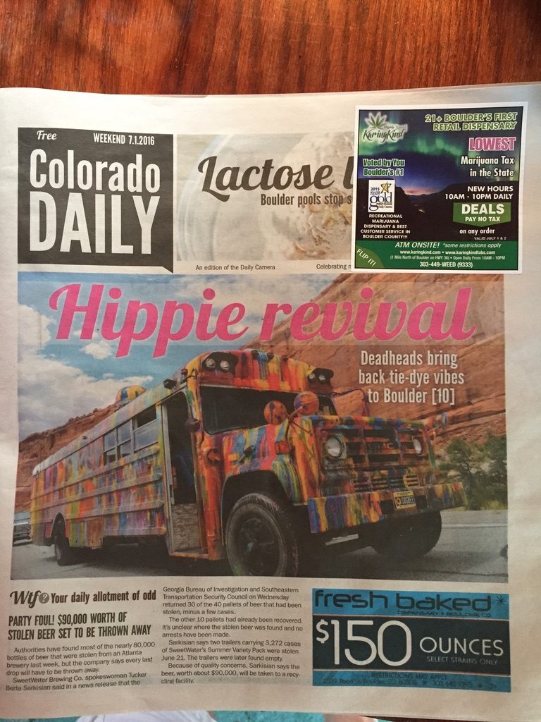 Colorado Daily newspaper front page: 'Hippie revival — Deadheads bring back tie-dye vibes to Boulder,' featuring a photo of SUGAREE