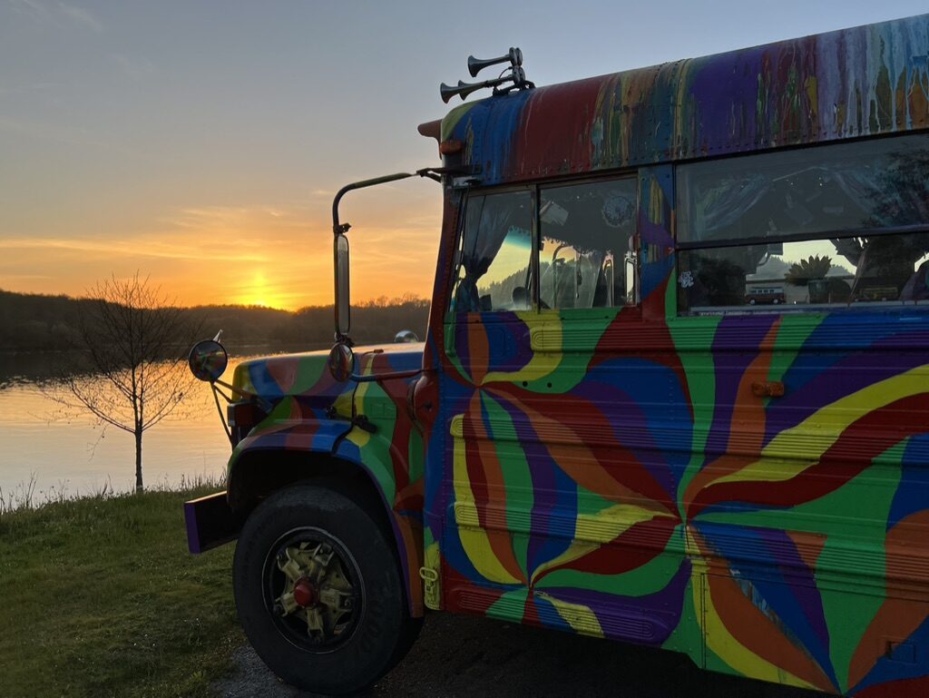 SUGAREE's front end at sunset beside a calm river