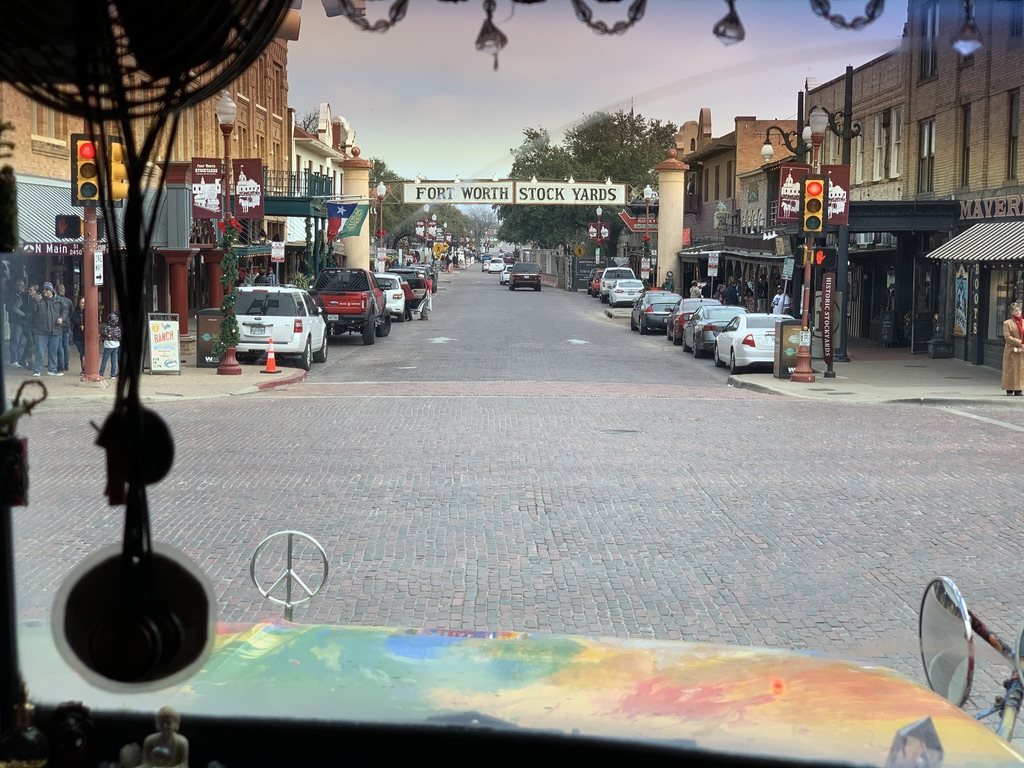 View through SUGAREE's windshield of the Fort Worth Stockyards sign over Exchange Avenue