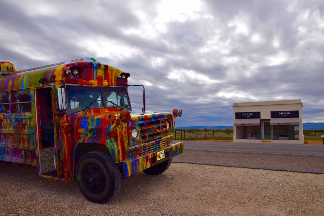 SUGAREE parked across the road from the Prada Marfa art installation